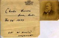 Photograph of Charles Darwin with attached note