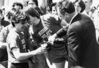 President Ragone pours champagne for class of 1982