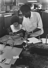 Two students work together in a laboratory