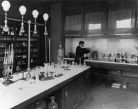 Albert W. Smith in his private chemistry lab