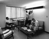 Students relax in a dormitory suite