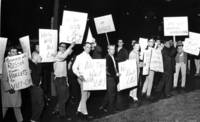Students carry signs demonstrating support for Vietnam War