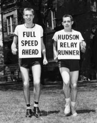 Hudson Relay runners show off their signs