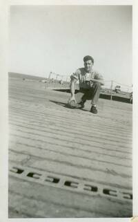 Photograph of Frank Czerwony on the Deck of the USS Kalinin Bay