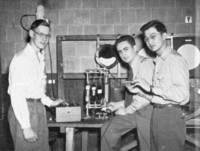 Three students conduct an experiment