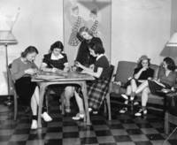 Students relax in the Mather House smoking room