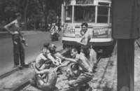 Men sit on tracks to block streetcar