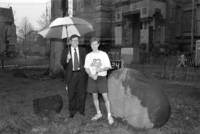 President Pytte and Hudson Relay runner under umbrella