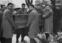 Case men carry a casket to mourn the loss of football