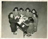 Photograph of Goldie Szabo Dispersing Paychecks to Higbee Employees, 1940