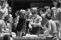 President Ragone uncorks champagne for class of 1982 Hudson Relay winners