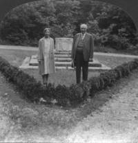 Andrew Squire and unidentified woman at water well