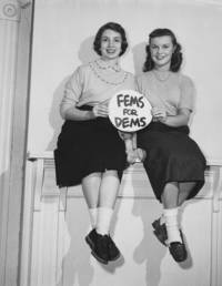 Two WRU women students holding sign supporting Democrats