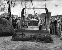 T. Keith Glennan on a bulldozer at Yost Hall ground-breaking