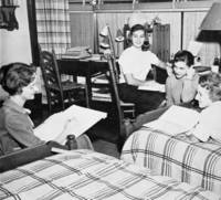 Students relax together in a dormitory room