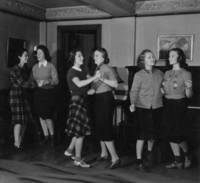 Female students dance together