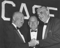 Dwight Eisenhower, T. Keith Glennan, and Henry Heald honor Eisenhower