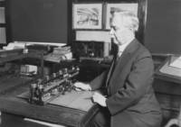 Dayton C. Miller with scientific equipment