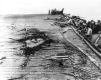 Photograph of the Damages to the Flight Deck of the USS Kalinin Bay Incurred during the Battle of Samar, 1944