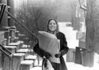Female student walking in the snow