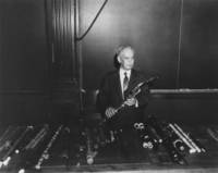 Dayton C. Miller with flute collection