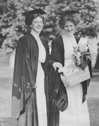 Two women graduates at commencement