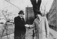 John Millis and Robert Morse shake hands