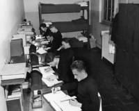 Student sailors study hard in their dormitory